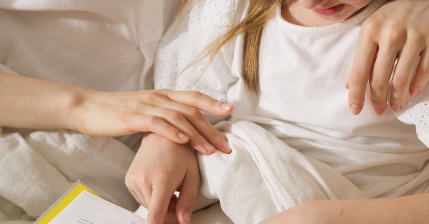 Storytellers - Mother and Daughter Reading a Book Together