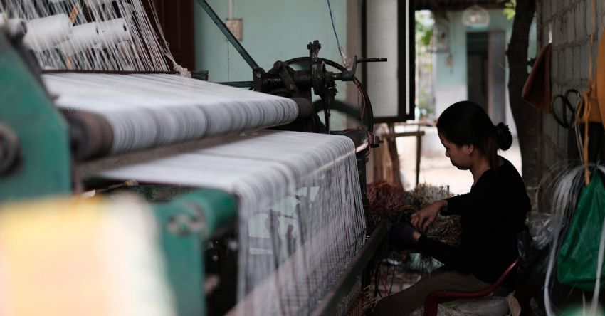 Weaving - Woman Working On A Textile Machine