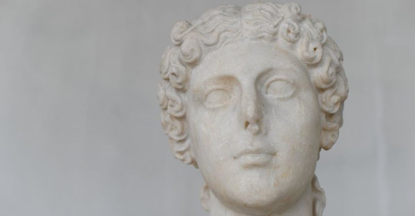 Harlem Renaissance - A marble bust of a woman with curly hair